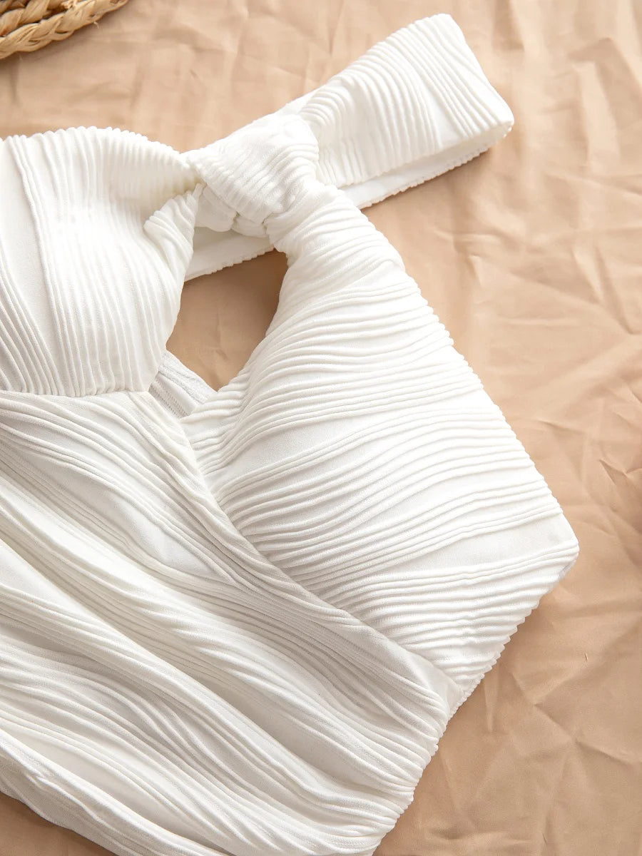 One shoulder openwork off-the-shoulder water ripple asymmetrical bandeau top.