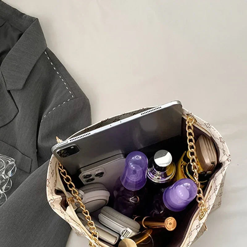 Summer High Quality PU Leather Fashion Large-capacity Shoulder Armpit Women's Bag Work Student Travel Female Retro Handbag Tote.