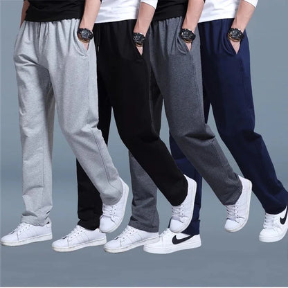 Men's solid color pants summer ice silk elastic quick drying loose sports pants suitable for casual and business wear ﻿.