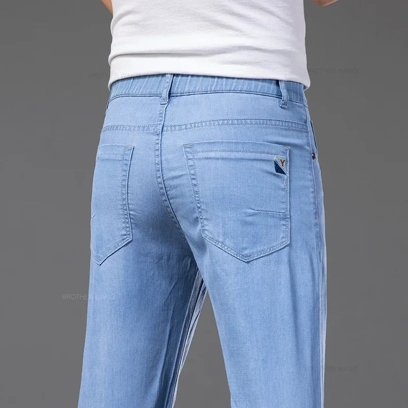 Summer Ultra Thin Men's Loose Jeans Lyocell Ice Silk Fashion Casual Business Denim Pants Straight Stretch Male Trousers.