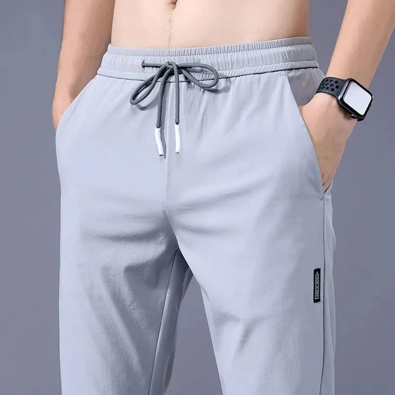 Ice Silk Men's Pants 2024 Summer New Black Gray Thin Business Casual Pants Outdoor Elastic Breathable Straight Leg Sweatpants.