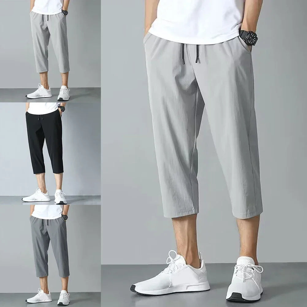 2025 New Summer Men's Ice Silk Pants Hong Kong Style Trendy Loose-Fit Straight-Leg Cropped Pants Korean Version Casual Pants.