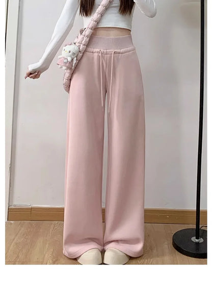 Graue Sporthose für Damen mit hoher Taille und lockerem, schlankem, geradem Bein und weitem Bein. Amerikanische Jogginghose.