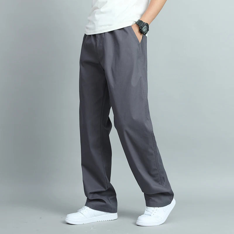 Big Size Men's Casual Cotton Trousers Loose Fit Straight Pants Multi Pocket Big Man Long Pants Mens Jogger Pants Summer Autumn.