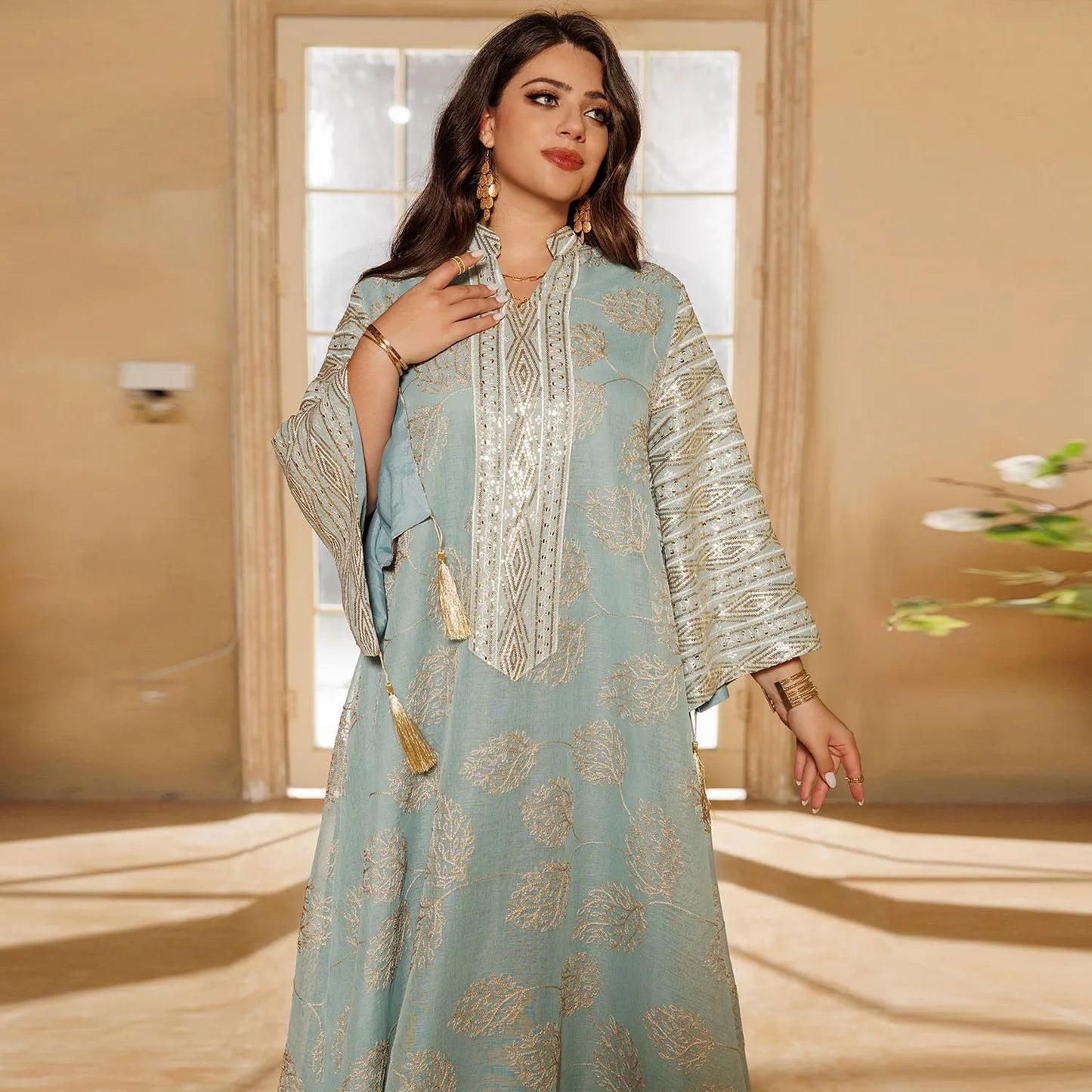 Muslim Women's Light Blue Islamic Embroidered Abaya with Gold Detailing Ideal for Formal Events in Middle East like UAE Saudi