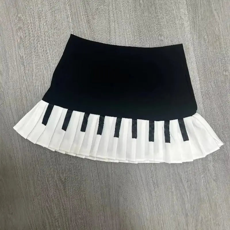 Y3NE Women Schoolgirl High Waist Pleated Flared Vintage Piano Print A Line Mini Skirt.