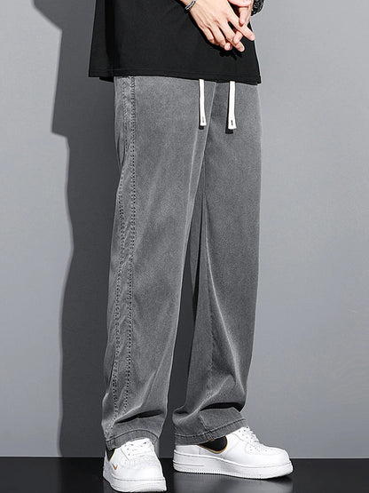 2024 Spring/Summer New Soft Lyocell Fabric Men's Jeans Thin Loose Straight Leg PantsDrawstring Elastic Waist Korean casual pants.