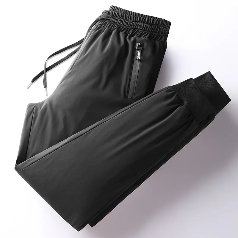 Winter Thick Warm and Windproof White Duck Velvet Legged Pants, New Down Pants for Outward Wearing, Cold Proof Sports Pants.