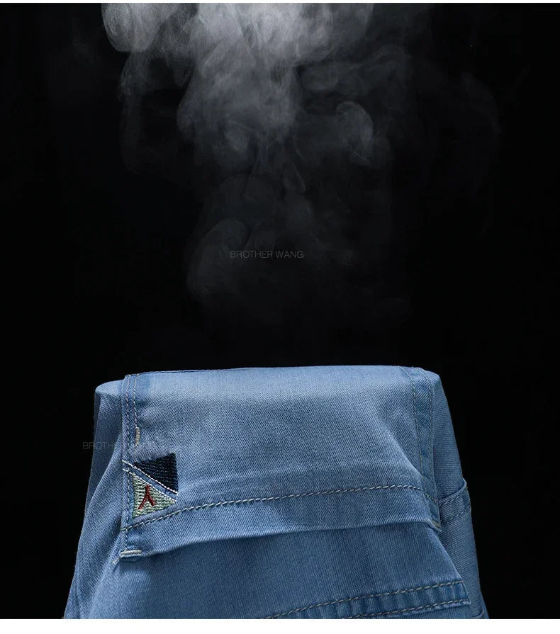 Summer Ultra Thin Men's Loose Jeans Lyocell Ice Silk Fashion Casual Business Denim Pants Straight Stretch Male Trousers.