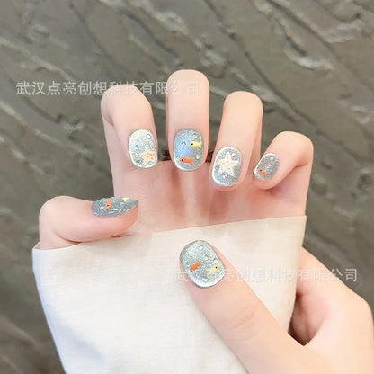 10pcs/set Handmade Press-On Nails - Blue Glossy Fish & Bubbles Design Short Oval Fake Nails with Cat Eye Effect False Nails.