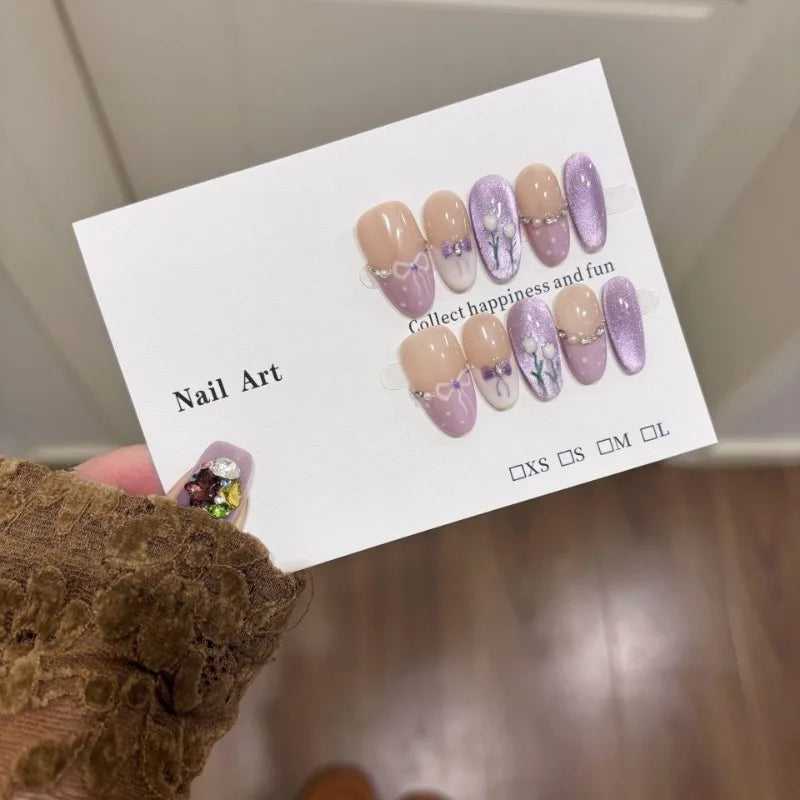 10Pcs mid-length oval White Moonlight Cat Eyes Nails Sliver Bowknot Press on False Nails with Pearl Diamond Full Cover Nail Tips.