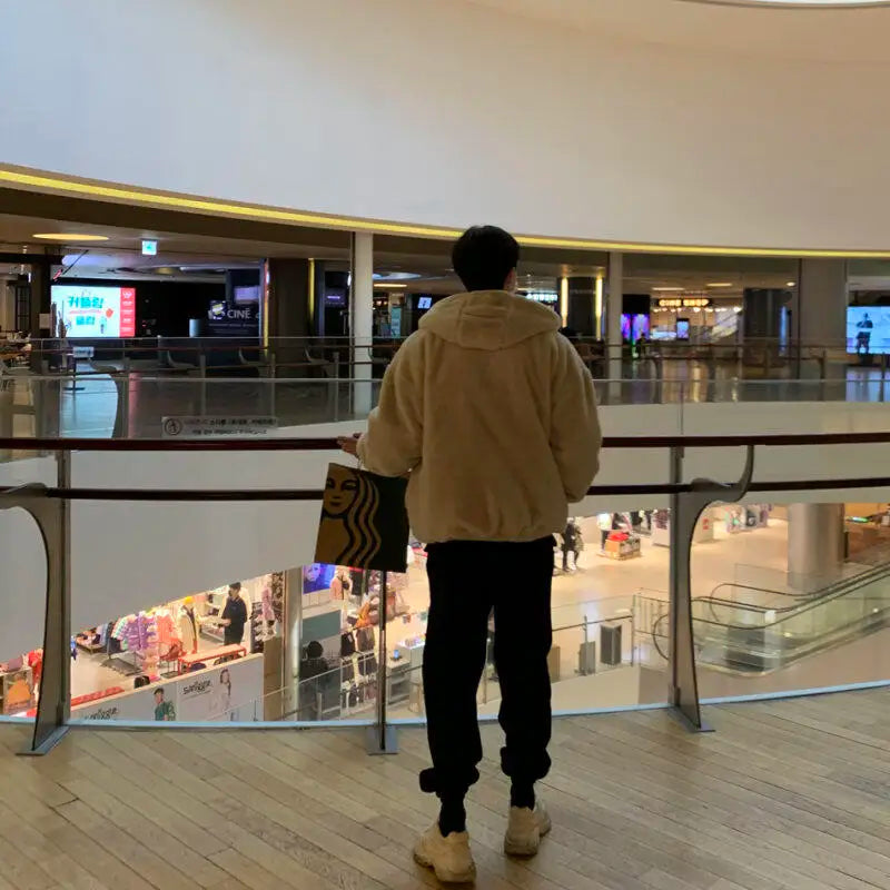 Winter faux lamb wool jacket men's padded thickened cotton clothing loose fleece jacket cotton clothing.