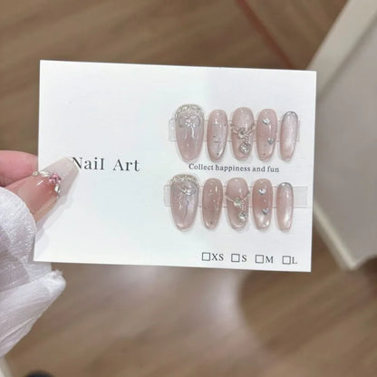 10Pcs mid-length oval White Moonlight Cat Eyes Nails Sliver Bowknot Press on False Nails with Pearl Diamond Full Cover Nail Tips.