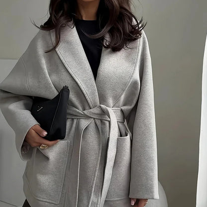 Herbst Winter Dicken Langen Ärmeln Woolen Mantel Einfache Feste Farbe Temperament Spitze Up Jacke frauen Revers Tasche Lose Oberbekleidung.