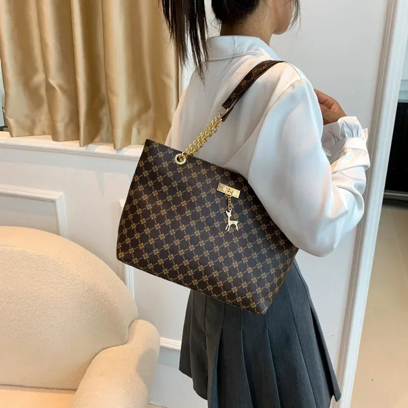 Summer High Quality PU Leather Fashion Large-capacity Shoulder Armpit Women's Bag Work Student Travel Female Retro Handbag Tote.