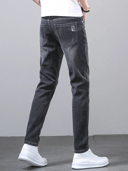 New Men's Four Seasons Business Jeans Fashionable Slim Fit Micro Elastic Straight Leg Long Pants.
