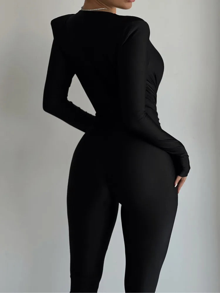 Mozision Deep V Neck Long Sleeve Skinny Jumpsuits Women Rompers Elegant Black High Waist Ruched Slim Sexy Jumpsuit Outfits.