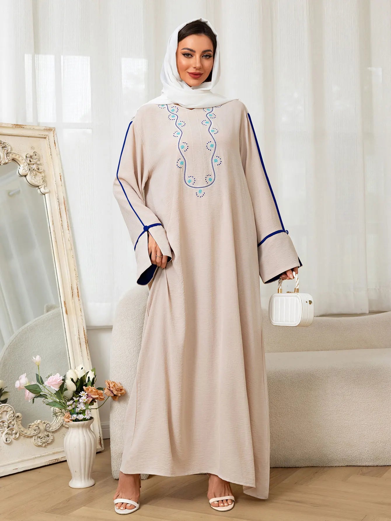 Beige Abaya Embroidered with Blue Patterns on Neckline Sleeves with Trim for Middle East Daily Wear Islamic Festivities Ramadan.