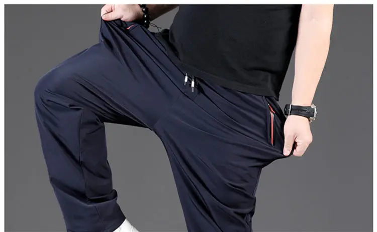8XL Casual Pants Mens Straight Loose Trousers Men Clothing Elastic Waist Quick Dry Pants Summer Fashion Oversized Joggers Pants.