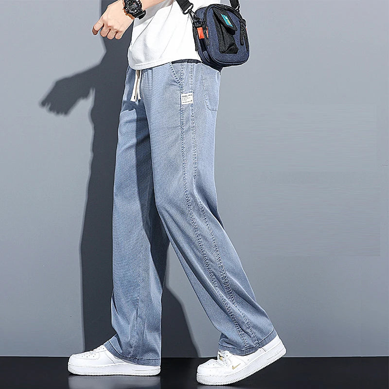 2024 Spring/Summer New Soft Lyocell Fabric Men's Jeans Thin Loose Straight Leg PantsDrawstring Elastic Waist Korean casual pants.