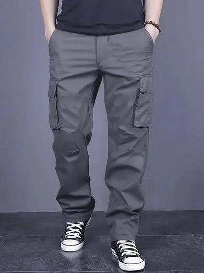 Men's casual multi pocket work pants with loose fit and drawstring waistband suitable for hikingfishingand outdoor exploration.