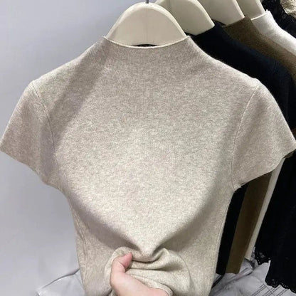 2025 grundlegende Rollkragen Solide Dünne Sommer Pullover Frauen Weibliche Gestrickte Pullover Dünne Kurzarm Bodycon Pullover.