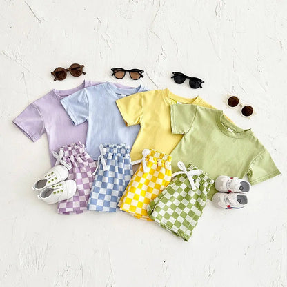 Ins Sommer Neugeborenen Jungen Mädchen Kleidung Baby Set Solide Kurzarm T-shirt + Schachbrett Shorts Baumwolle Casual 2PCS 0-3Y.