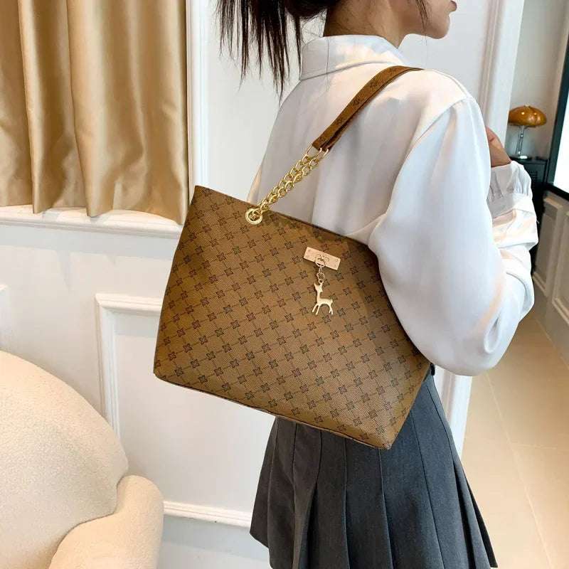 Summer High Quality PU Leather Fashion Large-capacity Shoulder Armpit Women's Bag Work Student Travel Female Retro Handbag Tote.