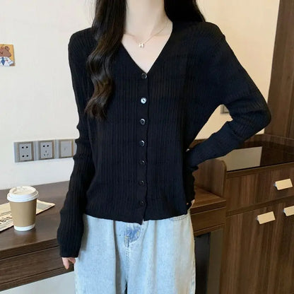 Women's Long-sleeved Button Cardigan Solid Color Casual Loose Fashion Top.