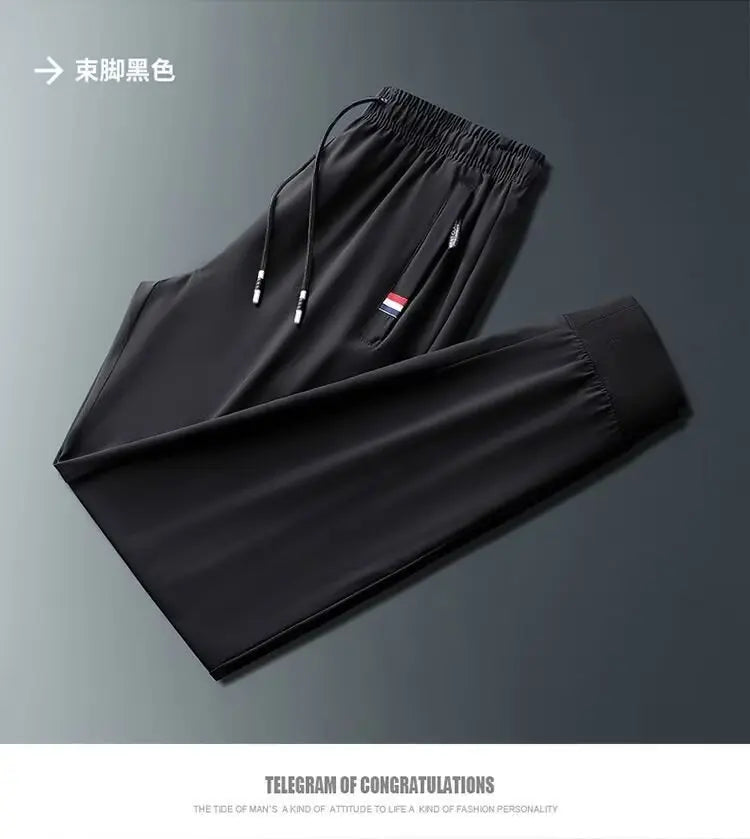 Men's Quick Dry Loose Fit Breathable Summer Lightweight Casual Pants Korean Style Elastic Sweatpants For Men.