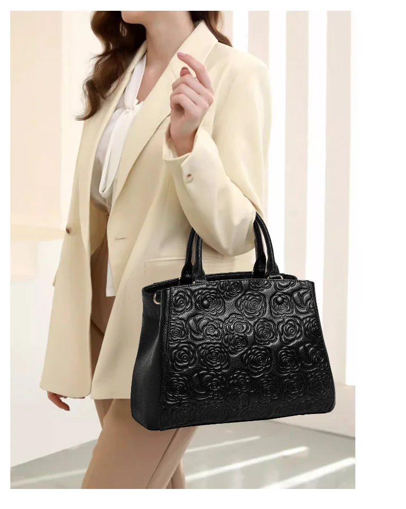 Leather handbag high sense handbag top layer leather rose pattern slung shoulder bag.