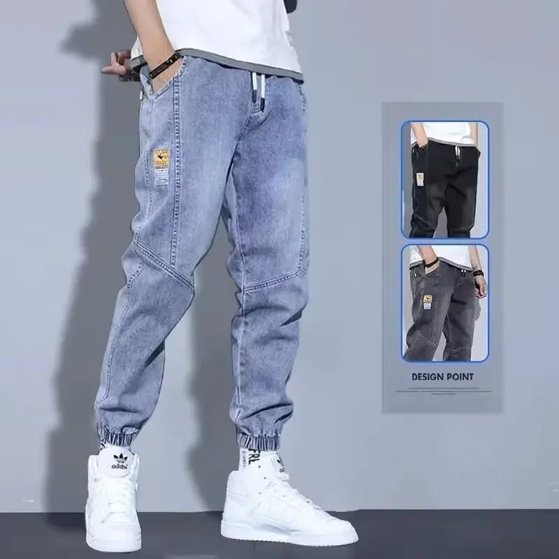 Lose lässige Harem-Jeans für Herren, trendige elastische Taille, einfache Neun-Punkte-Hose, gerades Bein, lockere Passform, Alltagskleidung, chinesische Marke.