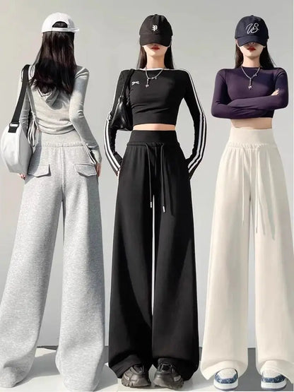 Graue Sporthose für Damen mit hoher Taille und lockerem, schlankem, geradem Bein und weitem Bein. Amerikanische Jogginghose.