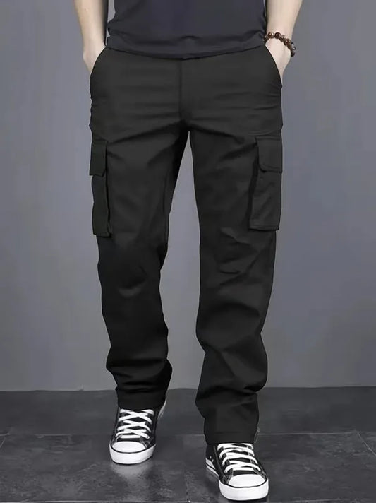 Men's casual multi pocket work pants with loose fit and drawstring waistband suitable for hikingfishingand outdoor exploration.