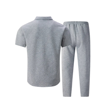 A fashionable and trendy two-piece short-sleeved shirtwithlong pants is perfect for men's daily casual wear in spring and autumn.