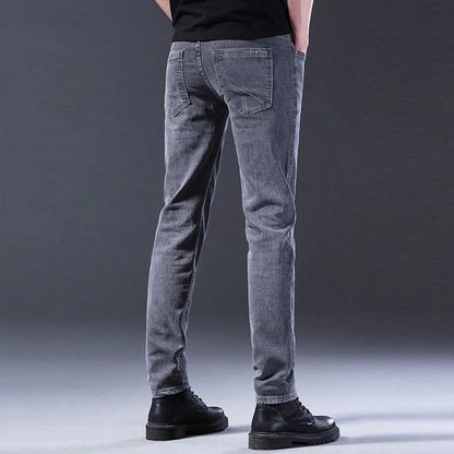 Men New Fashion Comfortable Slim Fit Jeans Male Loose Straight Smart Casual Denim Pants Formal Elasticity Look Taller Trousers.