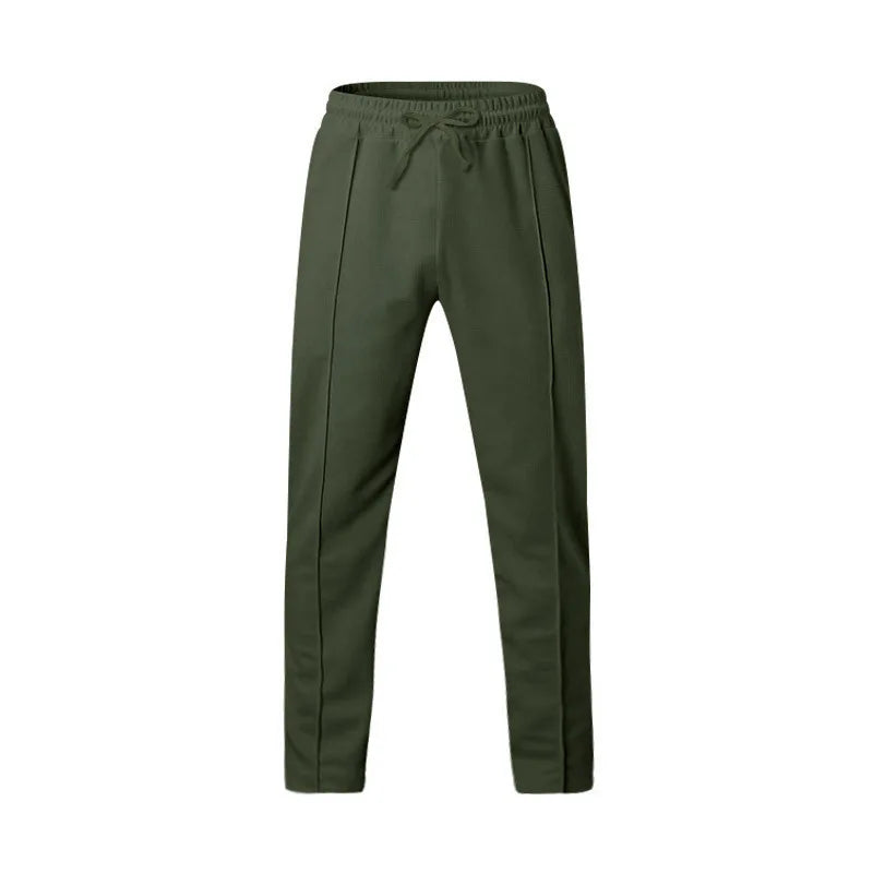 Cross-border spring and autumn thin men's sports and leisure drawstring loose jogging trend trousers sweatpants.