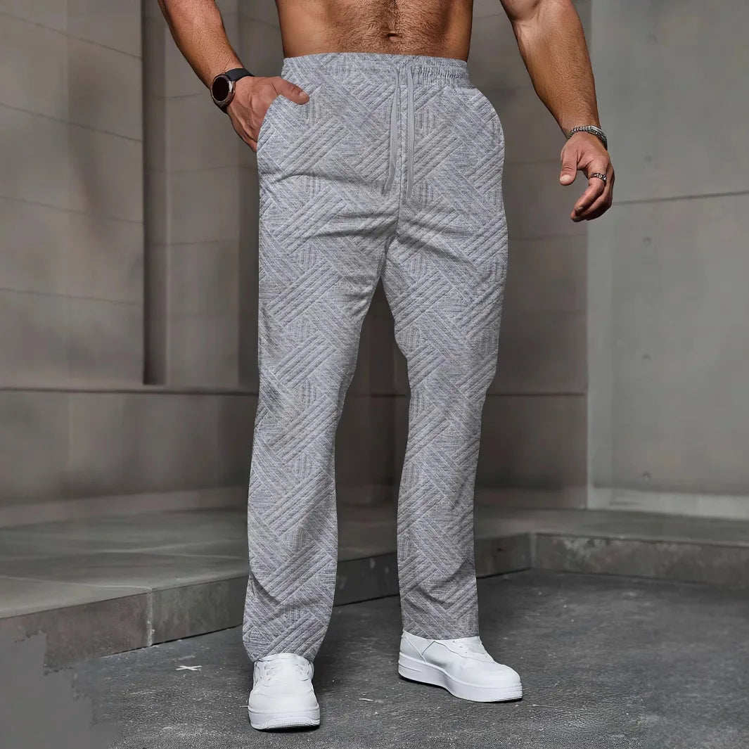 Men's sporty casual trousers, fashionable jacquard elastic waist street pants, solid-color loose all-season pants.