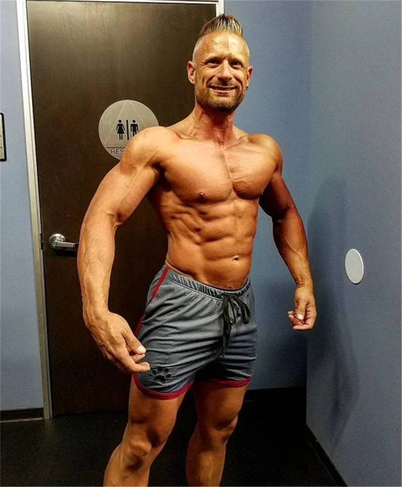 Mens Gym Fitness Shorts Bodybuilding running sports shorts Jogging Workout Male Summer Breathable Mesh Shorts men Sweatpants.