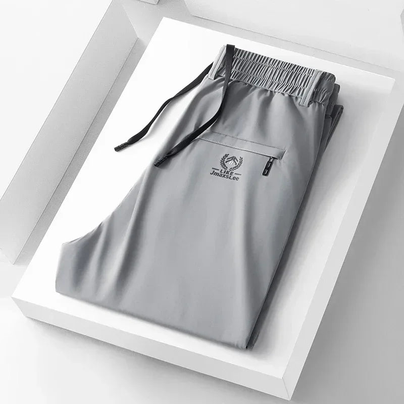 2024 Summer Soft Ice Silk Fabric Men's Thin Casual Pants Korean-style Fashion  Straight High Stretch Trousers Male Luxury Brand.