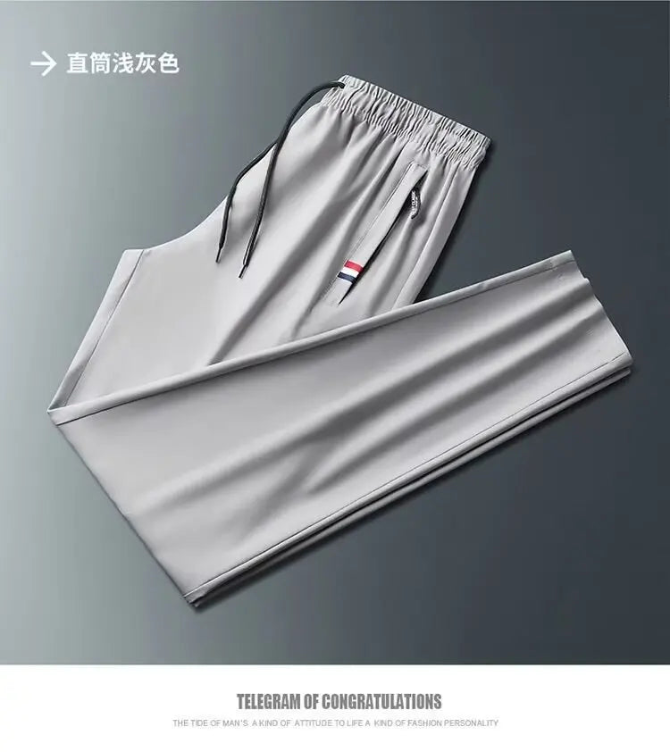 Men's Quick Dry Loose Fit Breathable Summer Lightweight Casual Pants Korean Style Elastic Sweatpants For Men.