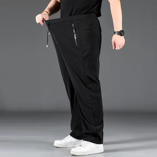 8XL Casual Pants Mens Straight Loose Trousers Men Clothing Elastic Waist Quick Dry Pants Summer Fashion Oversized Joggers Pants.