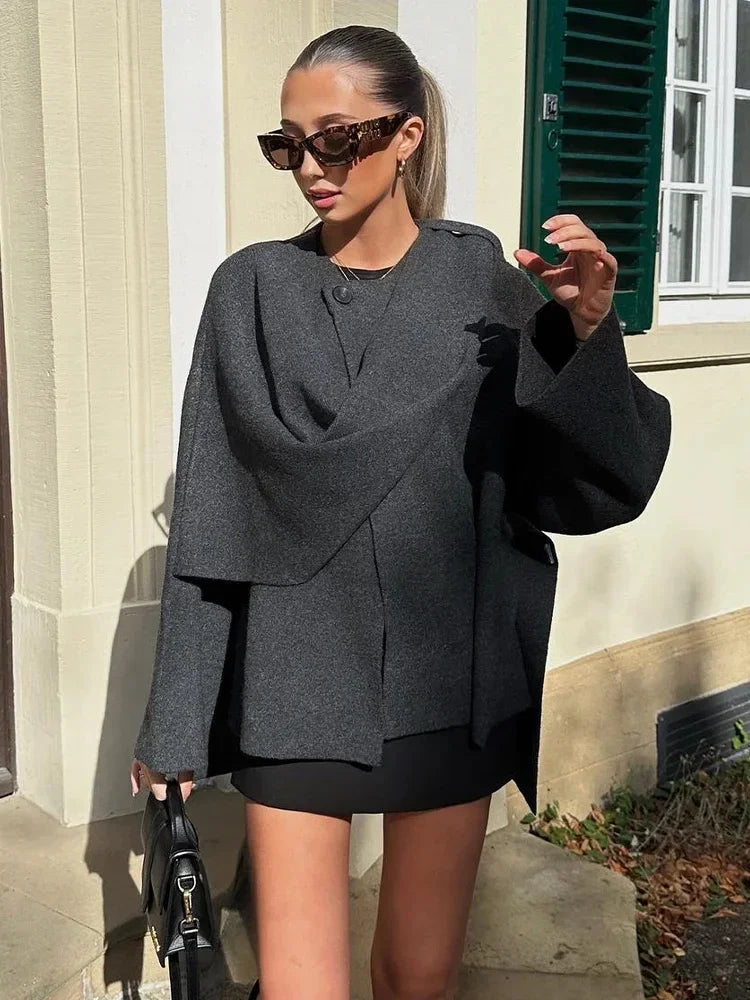 ZBZA Women's Asymmetric Scarf Knitted Jacket O-neck Single Button Side Slit Solid Loose Coat Winter New Female Chic Outerwear.