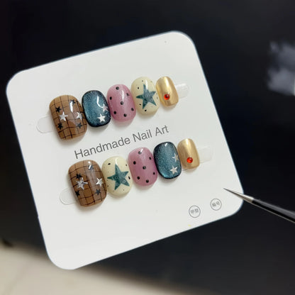 10pcs Short Oval Shaped Press-On Nails - Color Block Stripes & Star Designs Glossy Mix-and-Match False Nails for Women and Girls.