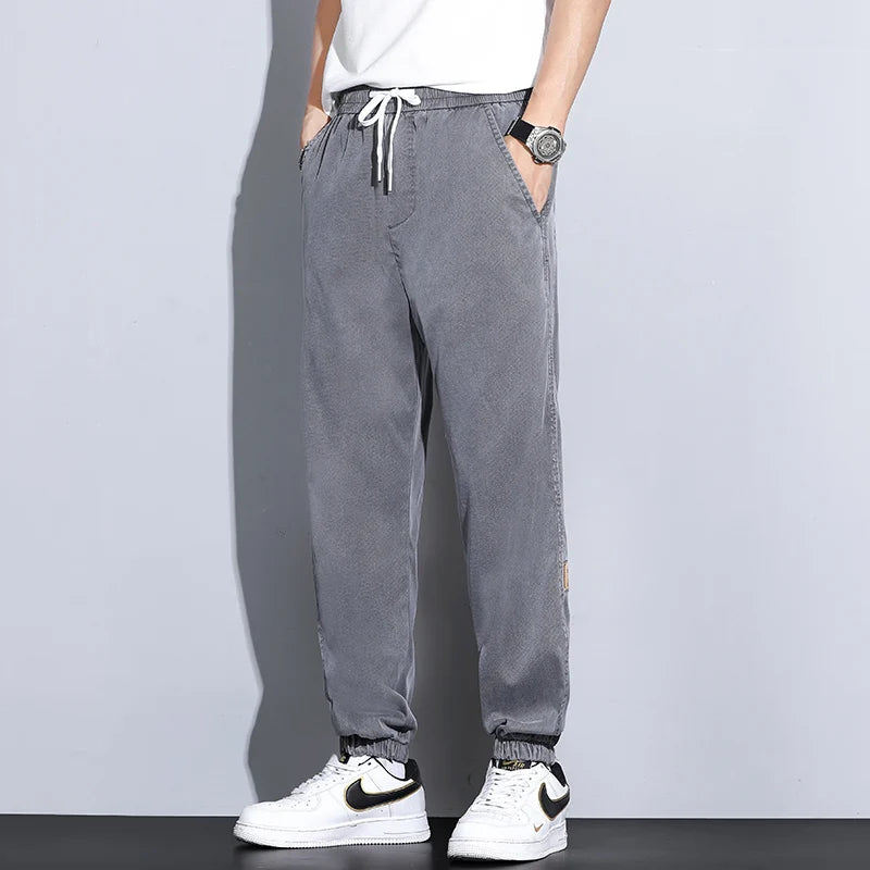 Men's Lyocell Loose Cuffed Tapered Pants 2025 Summer Autumn Comfortable Breathable Casual Long Pants Plus Size 5XL.