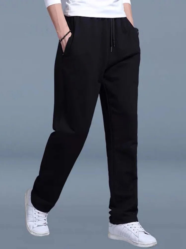 Men's solid color pants summer ice silk elastic quick drying loose sports pants suitable for casual and business wear ﻿.