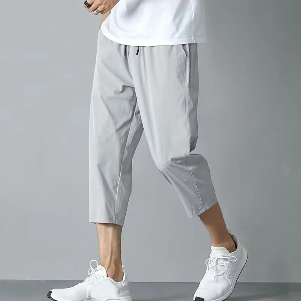 2025 New Summer Men's Ice Silk Pants Hong Kong Style Trendy Loose-Fit Straight-Leg Cropped Pants Korean Version Casual Pants.