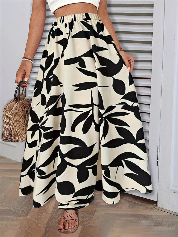 Fairyshely Casual Leaf Print Long Skirt For Women 2025 Summer Ruffle High Waist Maxi Skirt Ladies Elegant A line Pleated Skirt.