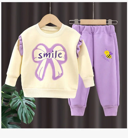 New 2025 Girls Fashion Cartoon Bowknot Letter Long Sleeve Pullover Sweatshirt + Pants Kids Spring Casual Sports Clothing Sets.