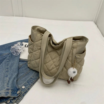 Black Large Capacity Handbag with Square Pattern, Durable Quilted Material, Multiple Pockets for Easy Storage & Cute Plush Charm.